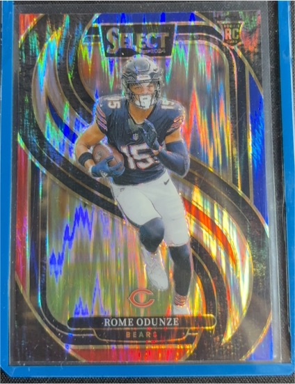 2024 Panini Select #136 Rome Odunze Premier Level Red/Blue Shock Prizm — front