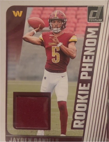 2024 Donruss Rookie Phenom Jerseys #RPJ-JDA Jayden Daniels — front