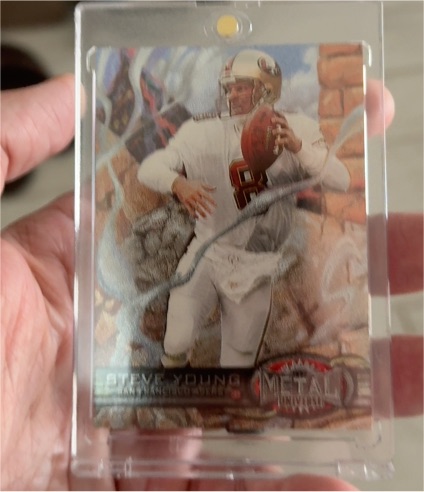 1997 Skybox Metal Universe #27 Steve Young — front