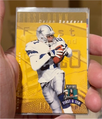 1997 Playoff First & Ten #180 Deion Sanders — front