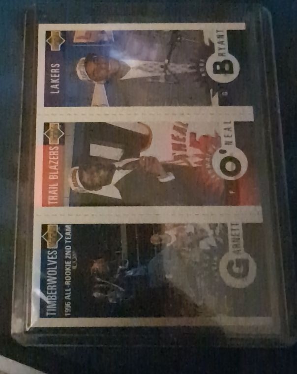 1996-97 Upper Deck Collector's Choice Mini #M129 Kobe Bryant / Kevin Garnett / Jermaine O'Neal — front
