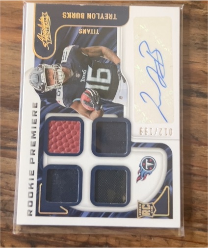 2022 Panini Absolute #212 Treylon Burks Rookie Premiere Quad Patch Auto — front