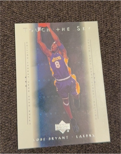2000-01 Upper Deck Game Jersey Edition Touch the Sky #T1 Kobe Bryant — front