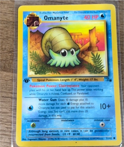 1999 Pokémon Fossil #52 Omanyte — front