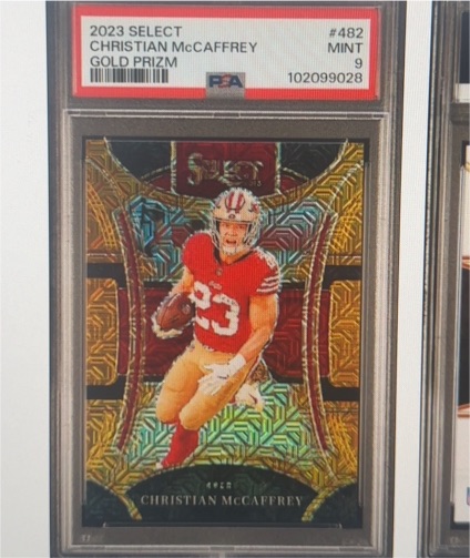 2023 Panini Select #482 Christian McCaffrey Gold Prizm — front