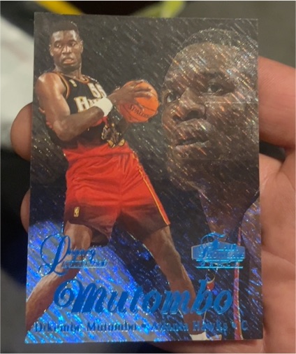 1997-98 Fleer Flair Showcase #42 Dikembe Mutombo — front