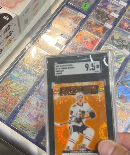 2023-24 Upper Deck Series 2 Hockey #DZ-79 Connor Bedard Orange Dazzlers — front