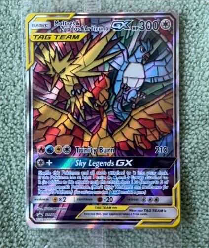 2019 Pokémon SM Promos #SM210 Moltres & Zapdos & Articuno GX — front