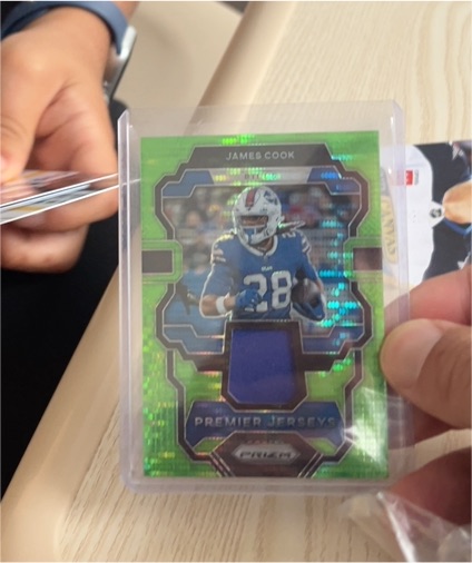 2023 Panini Prizm Premier Jerseys #PJ-JC James Cook — front