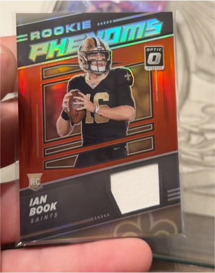 2021 Panini Donruss Optic #RP-27 Ian Book Rookie Phenoms Red Prizm Jersey — front