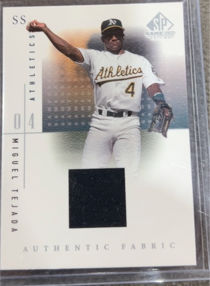 2001 Upper Deck SP Game Used #04 Miguel Tejada — front