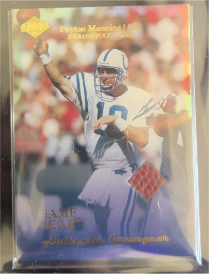 1997 Upper Deck Game Gear #GG1 Peyton Manning — front