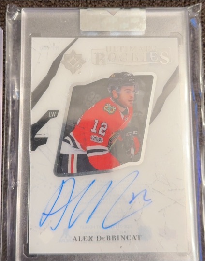 2017 Upper Deck Ultimate Rookies #7 Alex DeBrincat — front