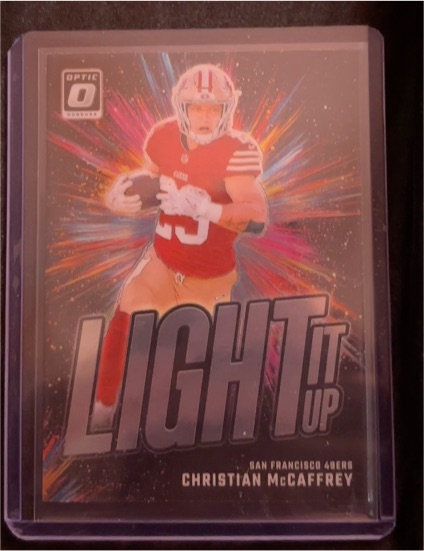 2023 Donruss Optic Light It Up Christian McCaffrey — front