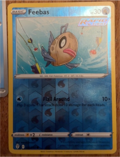 2021 Pokémon Rapid Strike #9 Feebas — front