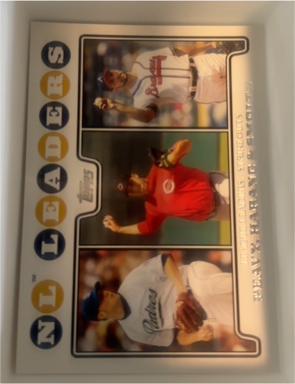 1993 Topps #NL Leaders Mark McGwire / Barry Larkin / Greg Maddux — front
