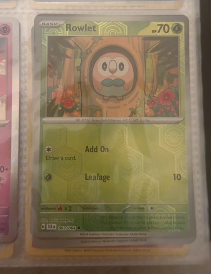 2016 Pokémon Sun & Moon #003 Rowlet — front