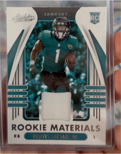 2021 Panini Absolute Rookie Materials #ARM-TET Travis Etienne Jr. — front