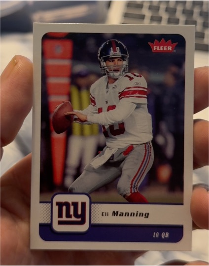 2006 Fleer #63 Eli Manning — front