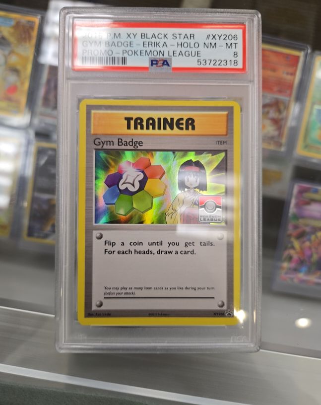 2016 Pokémon XY Black Star Promo #XY206 Erika Gym Badge Holo — front