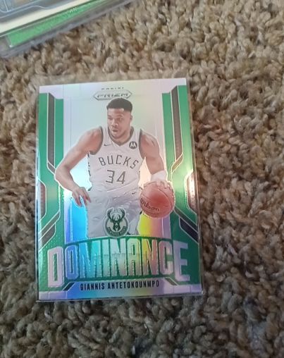 2024-25 Panini Prizm #4 Giannis Antetokounmpo Dominance Green Prizm — front