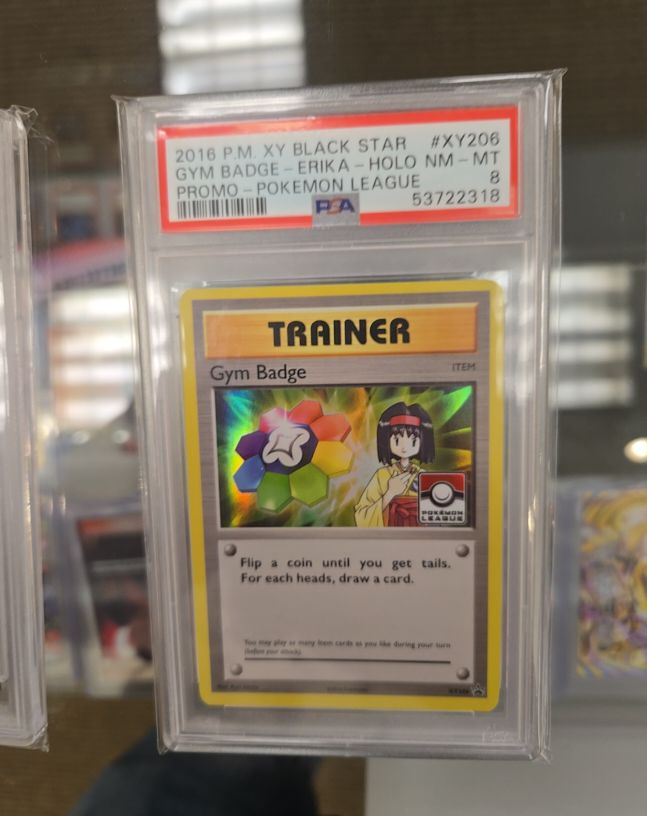 2016 P.M. XY Black Star #XY206 Gym Badge - Erika - Holo — front