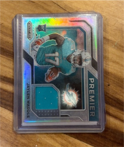 2021 Panini Prizm Premier Jerseys #PJ-8 Jaylen Waddle — front