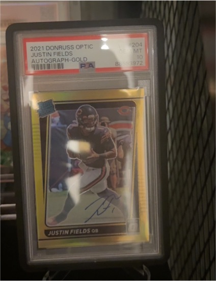2021 Donruss Optic #204 Justin Fields Autograph Gold — front