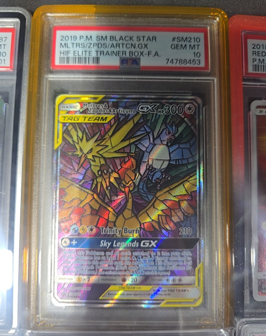 2019 Pokémon SM Black Star #SM210 Moltres & Zapdos & Articuno GX — front
