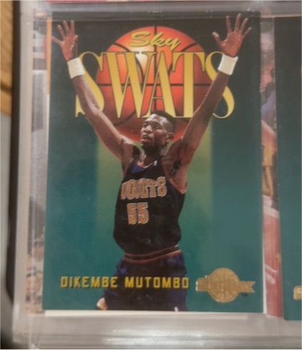 1994-95 Skybox Sky Swats #332 Dikembe Mutombo — front