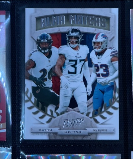 2024 Panini Prestige Alma Maters #10 Amani Hooker Geno Stone Micah Hyde — front