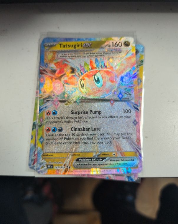 2022 Pokémon SV08: Surging Sparks #142 Tatsugiri ex — front