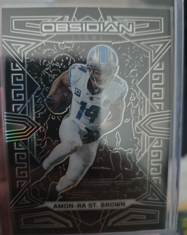 2023 Panini Obsidian #127 Amon-Ra St. Brown — front