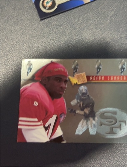 1995 Fleer Metal Platinum Portraits #9 Deion Sanders — front