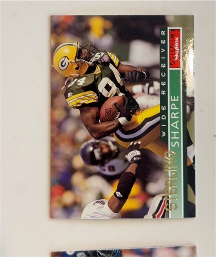 1995 SkyBox Impact #55 Sterling Sharpe — front