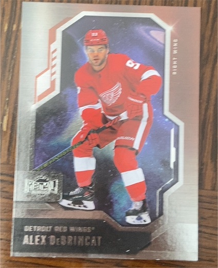 2024-25 Upper Deck SkyBox Metal Universe #17 Alex DeBrincat — front
