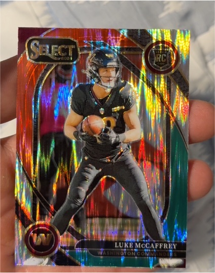 2024 Panini Select #279 Luke McCaffrey Red & Blue Shock Prizm Club Level — front