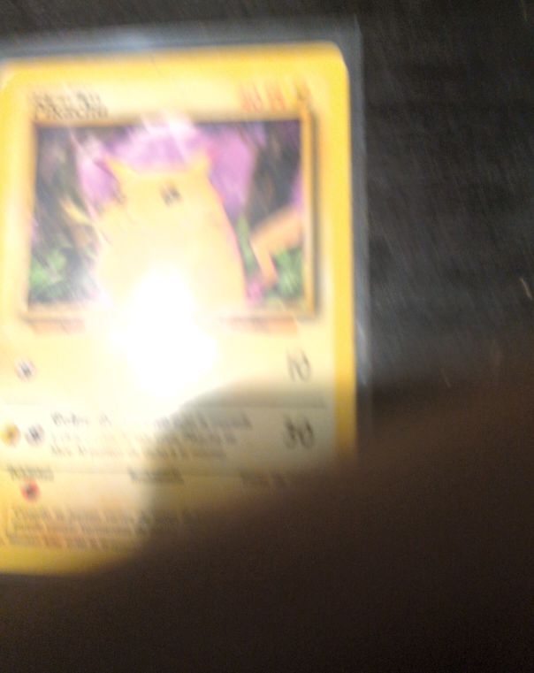 1999 Pokémon #14 Raichu — front