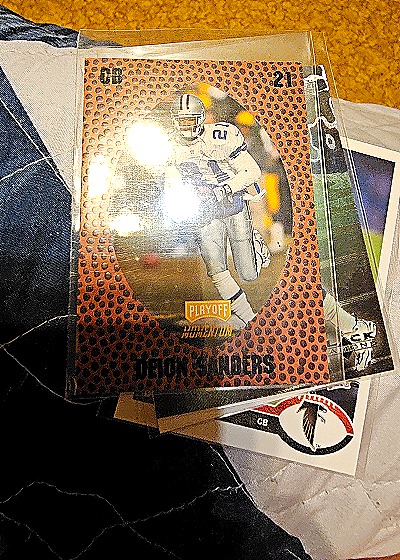 1995 Playoff Momentum #21 Deion Sanders — front