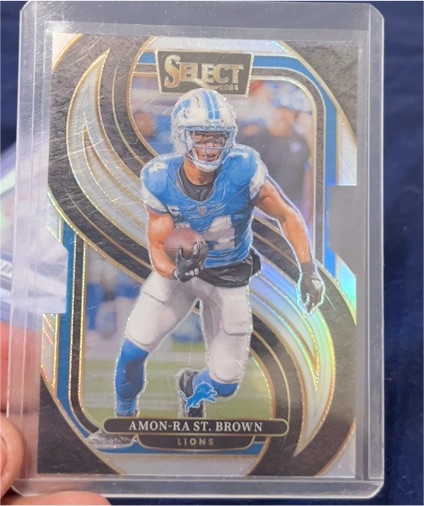 2024 Panini Select #105 Amon-Ra St. Brown Premier Level Silver Prizm — front