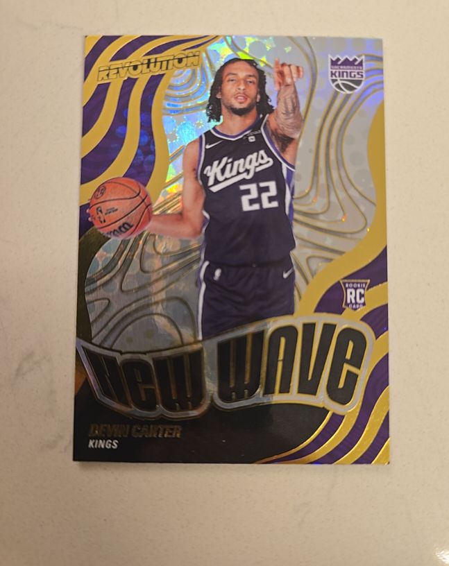 2024-25 Panini Revolution #8 Devin Carter New Wave RC — front