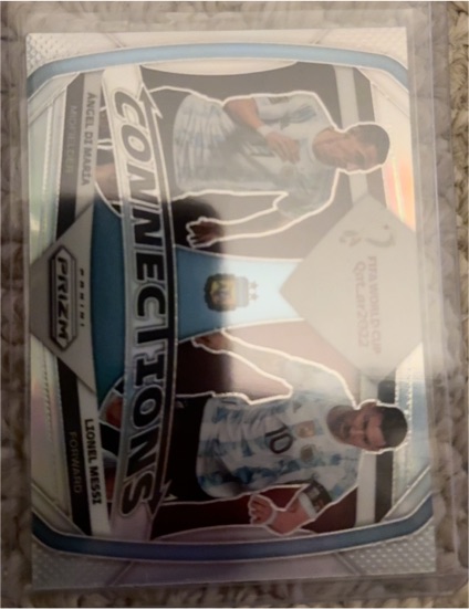 2022 Panini Prizm World Cup Connections #1 Lionel Messi Angel Di Maria — front