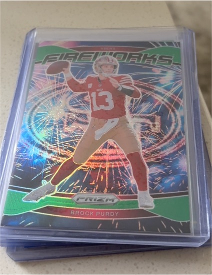 2024 Panini Prizm Fireworks #2 Brock Purdy — front