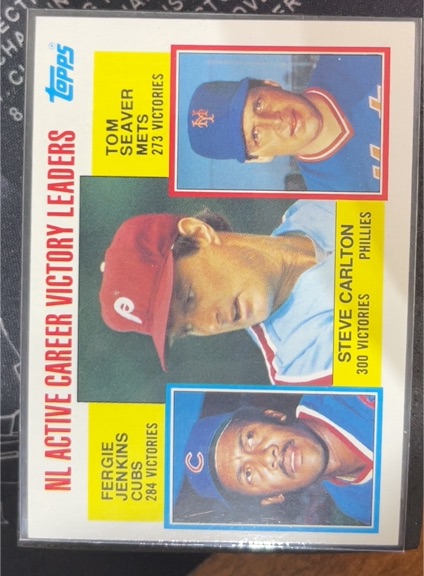 1984 Topps #706 NL Active Career Victory Leaders Steve Carlton / Fergie Jenkins / Tom Seaver — front