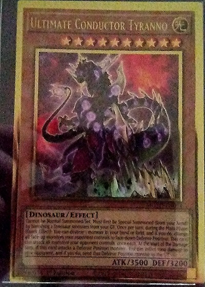 Yu-Gi-Oh! MGED-EN014 Ultimate Conductor Tyranno — front
