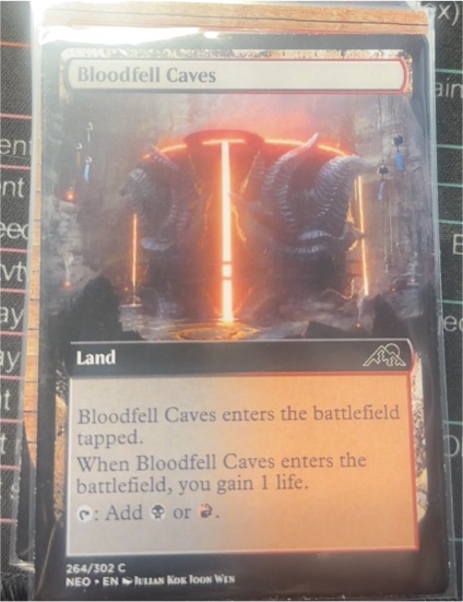 2022 Kamigawa: Neon Dynasty #264 Bloodfell Caves — front