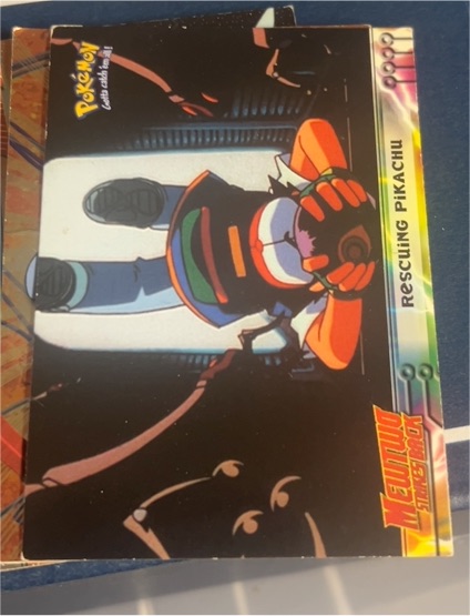 1999 Topps Pokemon The First Movie #30 Rescuing Pikachu — front