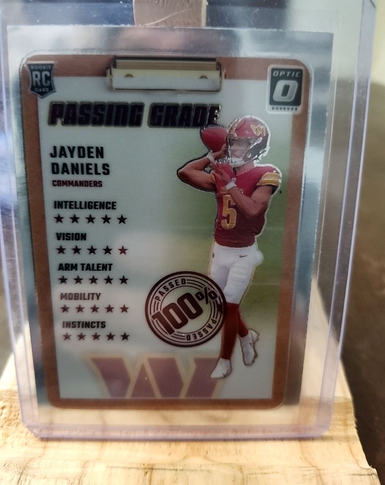 2024 Donruss Optic Passing Grade #2 Jayden Daniels RC Commanders — front