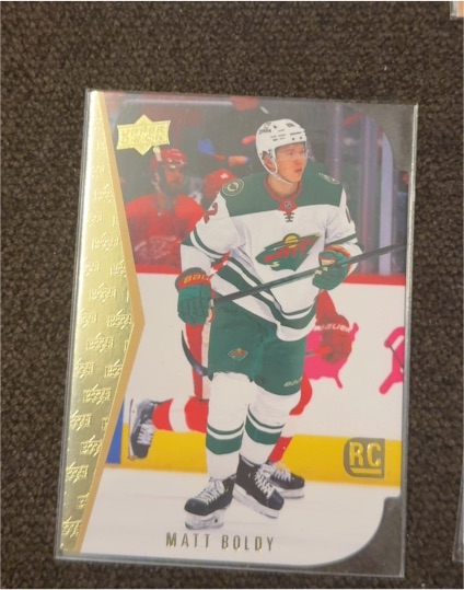 2022-23 Upper Deck Series 1 1994-95 Tribute Retro Die-Cut #RDT-10 Matt Boldy — front