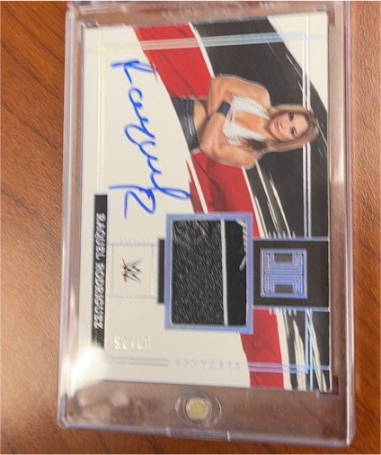 2022 Panini Impeccable WWE Bayley Elegance Memorabilia Auto #13/33 — front